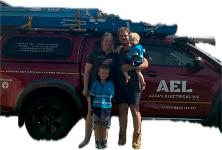 The family behind Azza's Electrical standing beside the AEL work vehicle